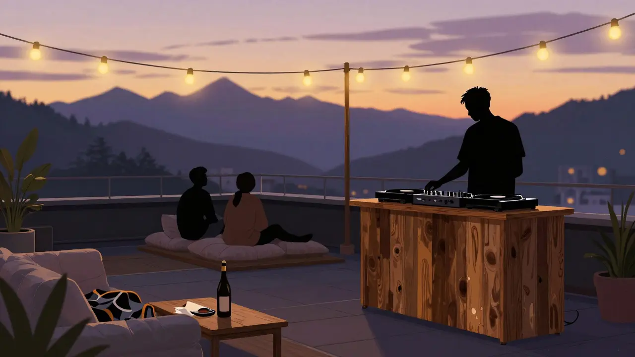 Rooftop club at sunset with people lounging on cushions, Alps in distance, string lights overhead.